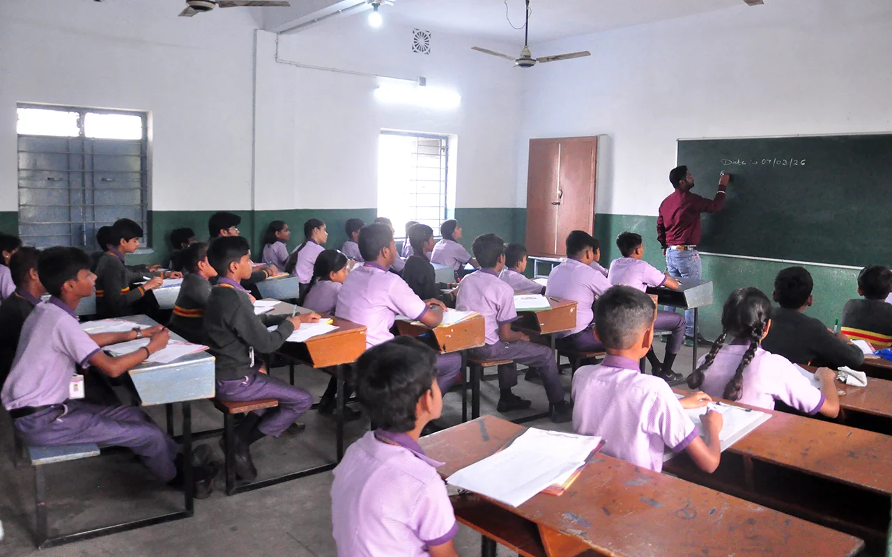 Teacher conducting a classroom session at Don Bosco Ramkanali